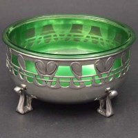 Lot 392 - Archibald Knox bowl with Powell glass liner