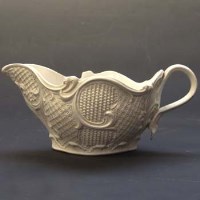 Lot 428 - Saltglaze sauceboat