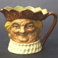 Lot 516 - Royal Doulton ''Old King Cole'' musical jug