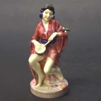 Lot 518 - Royal Doulton geisha girl