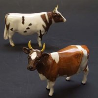 Lot 520 - Beswick Ayrshire cow and bull