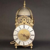 Lot 530 - Brass lantern clock