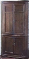 Lot 539 - George III oak corner cupboard