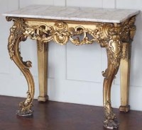 Lot 543 - Gilt marble - topped table