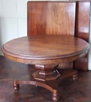 Lot 545 - Mahogany Pull-out dining table with three leaves