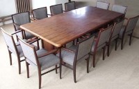 Lot 547 - Rosewood dining table and twelve chairs