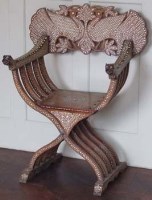 Lot 561 - Inlaid elbow chair