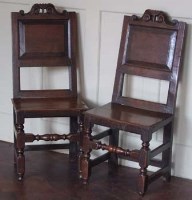Lot 570 - Pair of 17th century oak single chairs