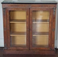 Lot 573 - Victorian walnut two door bookcase