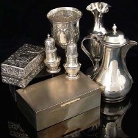 Lot 296 - Silver hotwater jug, goblet, specimen vase, pair