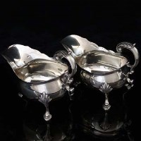 Lot 299 - Pair of London silver Garrard sauceboats
