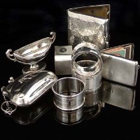 Lot 303 - Silver purse, match case, cigarette case; small