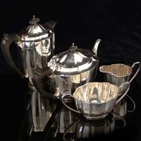 Lot 307 - Silver four piece tea set