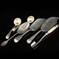 Lot 310 - Two Geo silver fish slices, E.P cheese scoop; PR