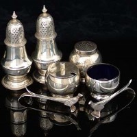 Lot 311 - Pair silver pepperettes; 3 - piece condiment set
