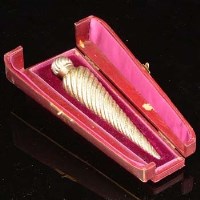 Lot 313 - Silver gilt twisted scent bottle in case