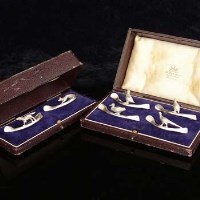 Lot 316 - Cased set four napkins (silver) decorated with