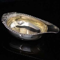 Lot 318 - Silver pap boat