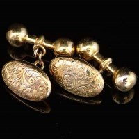 Lot 332 - Pair of 15ct gold oval hollow cufflinks engraved
