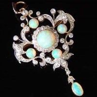 Lot 337 - Opal and diamond brooch/pendant