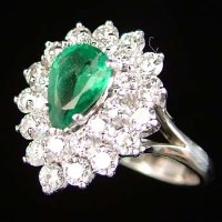 Lot 366 - Emerald and diamond pear-shaped ring