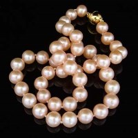 Lot 388 - Cultured pink pearl single strand necklace