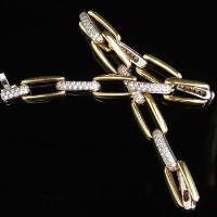 Lot 415 - 18ct white and yellow gold diamond bracelet