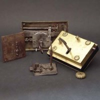 Lot 440 - Brass door lock with return and key and two other