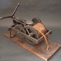 Lot 445 - Spit engine with wooden barrel