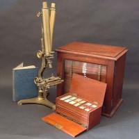 Lot 465 - Binocular microscope and two cases of slides