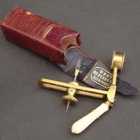 Lot 488 - 19th century miniature brass magnifying