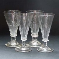 Lot 530 - Four Wrythen and plain moulded wine glasses