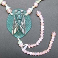 Lot 549 - Glass necklace in the style of Argy Rousseau
