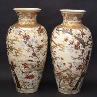 Lot 553 - Pair of Japanese earthenware vases