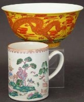 Lot 555 - A Chinese Famille rose mug and a Chinese