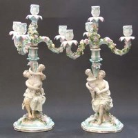 Lot 594 - A pair of late 19th century Dresden maiden and