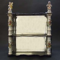 Lot 595 - A late 19th century German porcelain and ebonised
