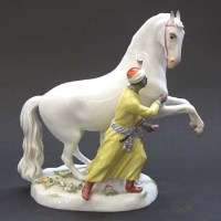 Lot 603 - Meissen blackamoor horse tamers
