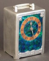 Lot 709 - Liberty & Co, a pewter, copper and enamel carriage clock
