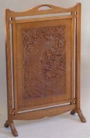 Lot 749 - Carved oak firescreen