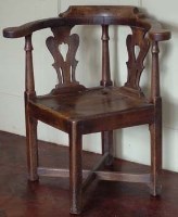 Lot 760 - George III elm corner chair