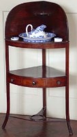 Lot 804 - Mahogany mid 19th century corner washstand jug