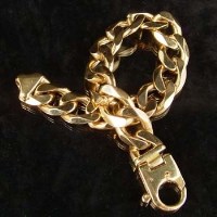 Lot 377 - 9ct gold flat curb bracelet.