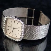 Lot 426 - An 18ct gold and diamond Jaeger-LeCoultre wristwatch