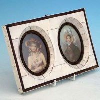 Lot 450 - Two miniatures set  in single piano key frame.