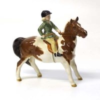 Lot 610 - Beswick Girl on pony.