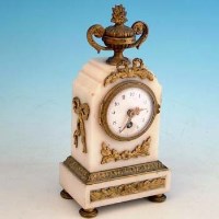 Lot 611 - French marble and gilt mantel clock.