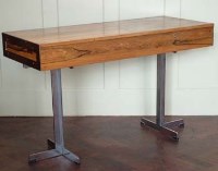 Lot 632 - Rosewood and chrome two drawer desk.