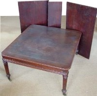 Lot 653 - Mahogany extending table (three leaves).