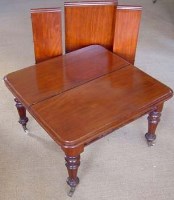 Lot 666 - Victorian mahogany wind out table complete with
